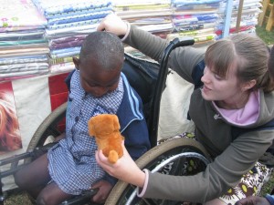 A volunteer working with a child from Letaba school