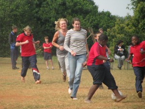 Ruth and Jane try to take hold of the ball